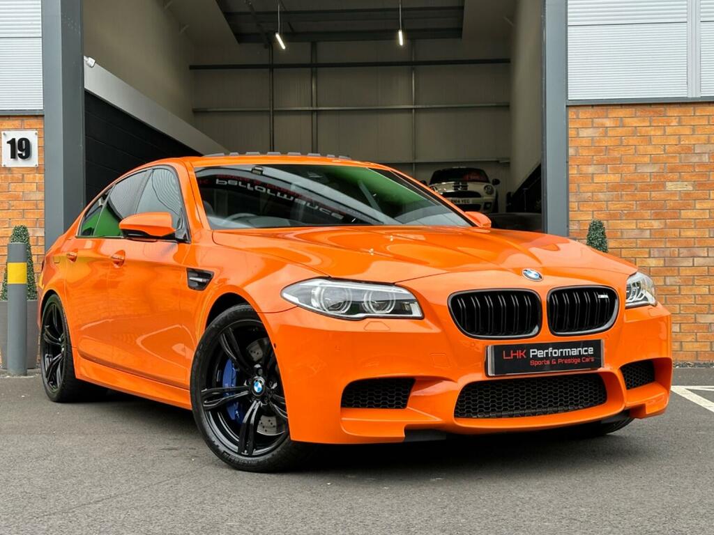 Compare BMW M5 Saloon 4.4 EG16WWX Orange