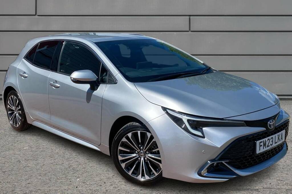 Compare Toyota Corolla 1.8 Hybrid Design Cvt FM23LKA Silver