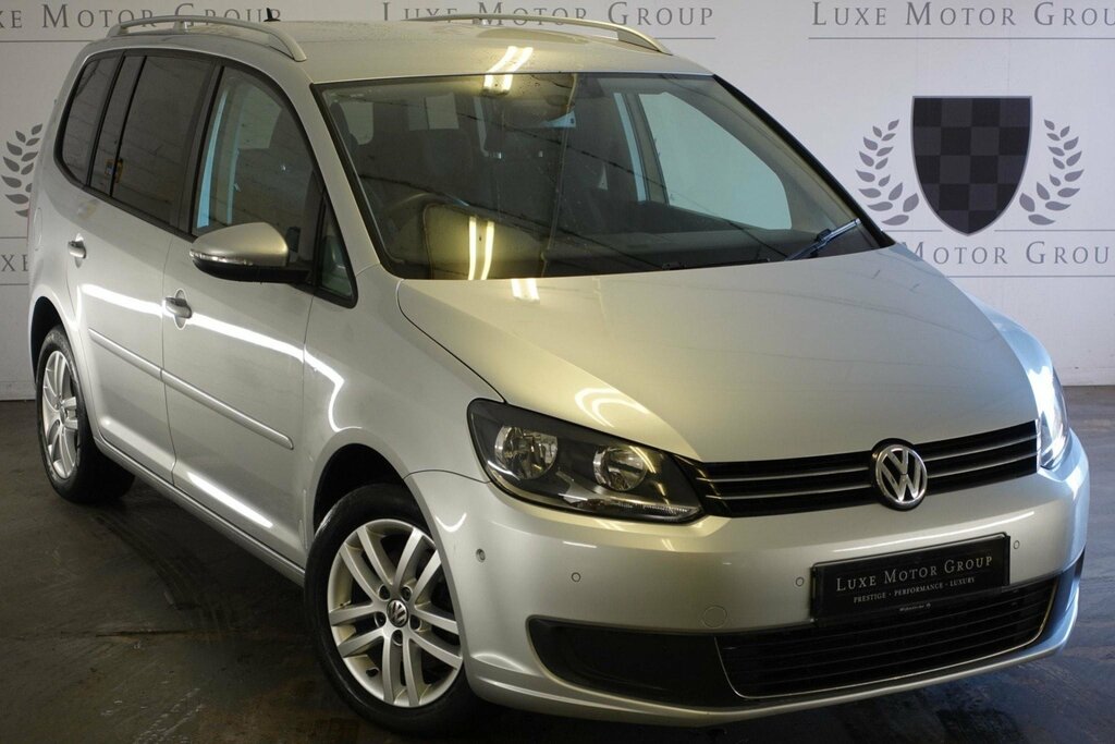 Compare Volkswagen Touran 2011 11 1.6 RJ11NYT Silver