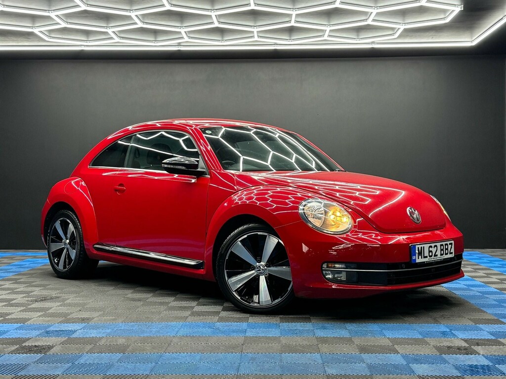 Compare Volkswagen Beetle 2.0 Tdi Sport Euro 5 ML62BBZ Red