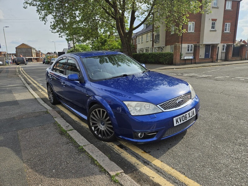 Compare Ford Mondeo St Tdci KV06XJA Blue