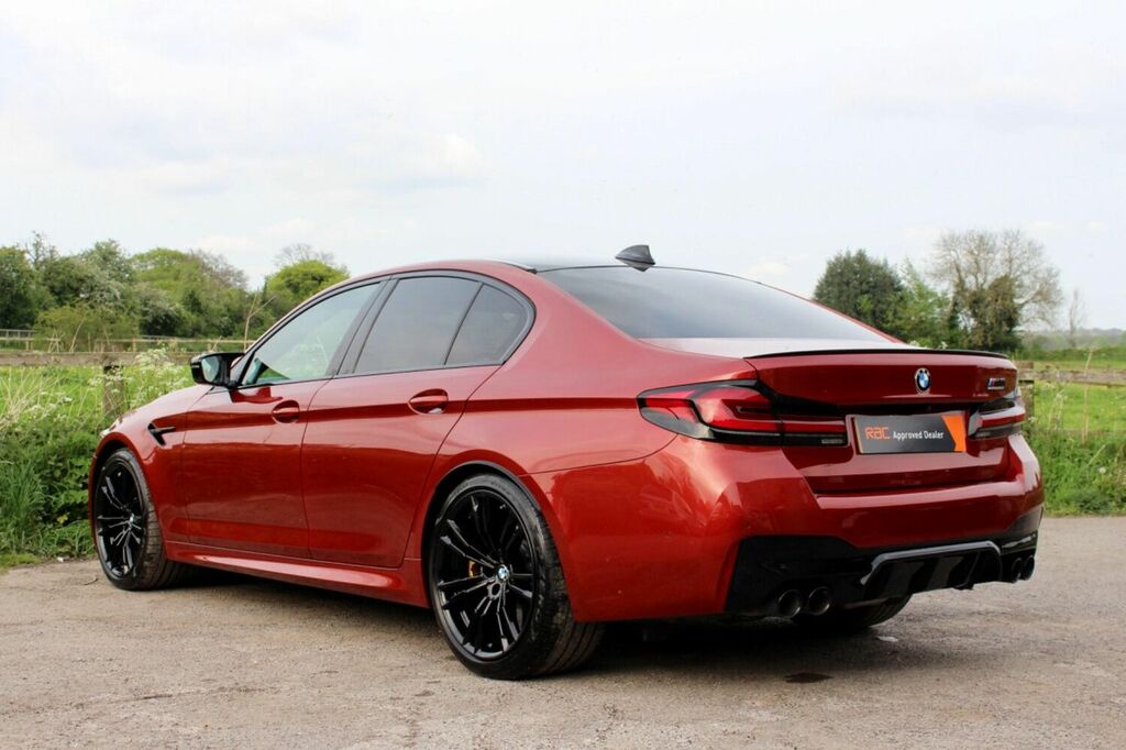 Compare BMW M5 M5 Competition CV21SFO Red