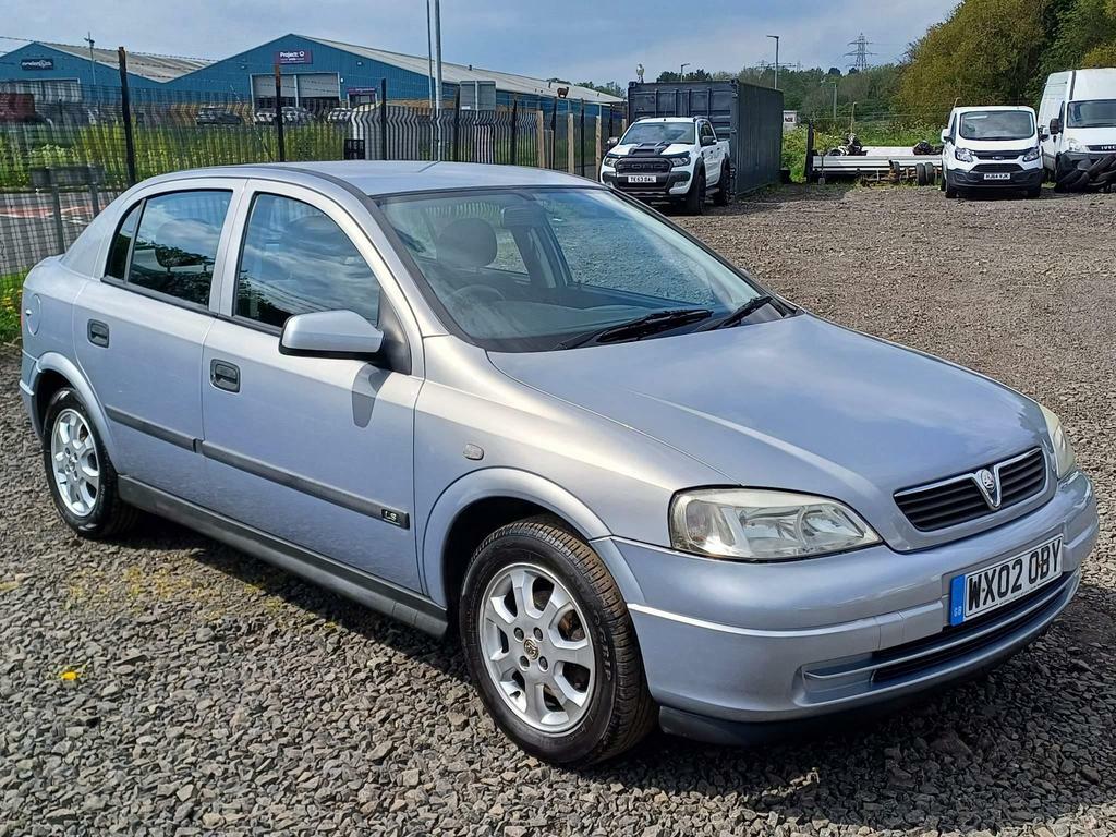 Compare Vauxhall Astra 1.6I Ls WX02OBY Grey