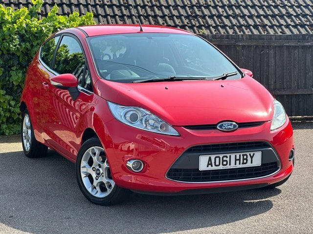 Compare Ford Fiesta 1.2 Zetec 81 Bhp AO61HBY Red