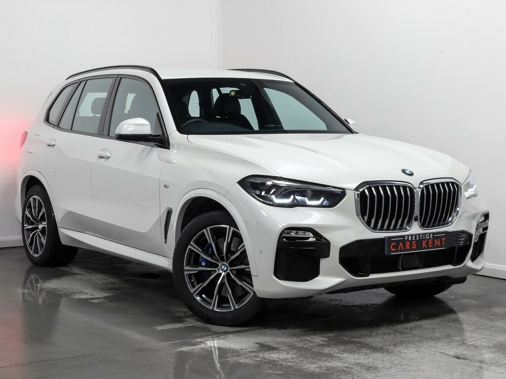Compare BMW X5 Xdrive45e M Sport PJ70UKB White
