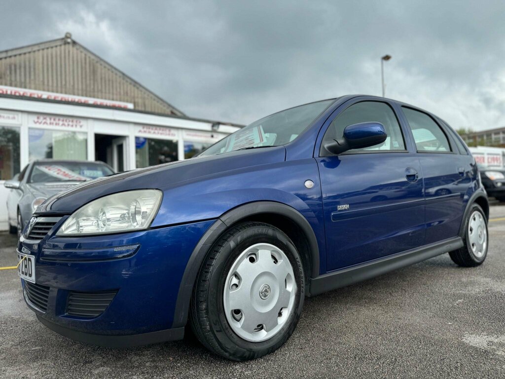 Compare Vauxhall Corsa 1.2I 16V Design Ac KP56ZBD Blue