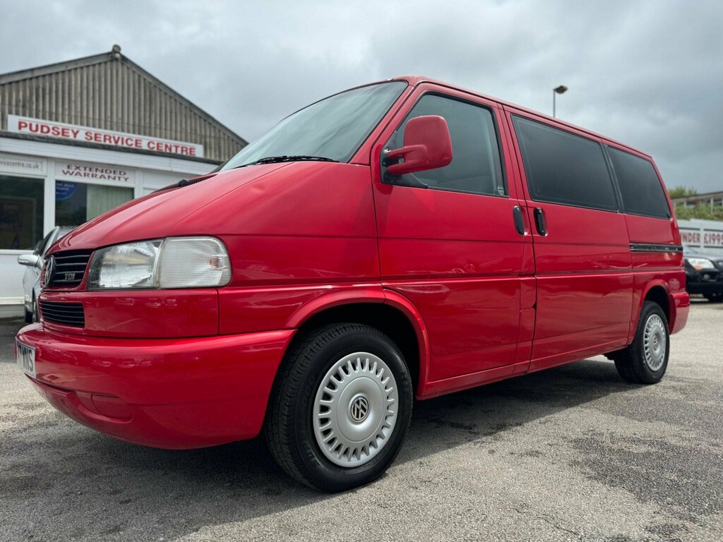 Compare Volkswagen Caravelle 2.5 Td Gl 7 Seats W547WNS Red