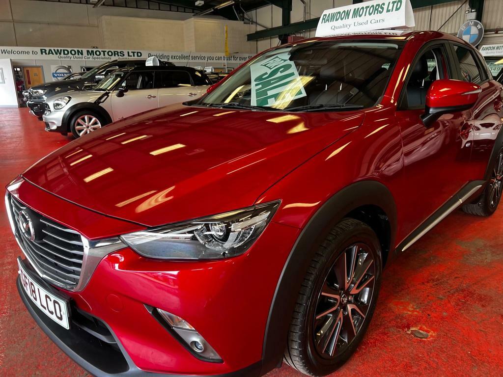 Compare Mazda CX-3 1.5 Skyactiv-d Sport Nav Euro 6 Ss GF18LCO Red
