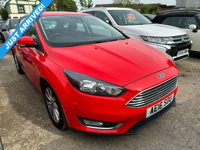 Compare Ford Focus Hatchback AE16SOU Red