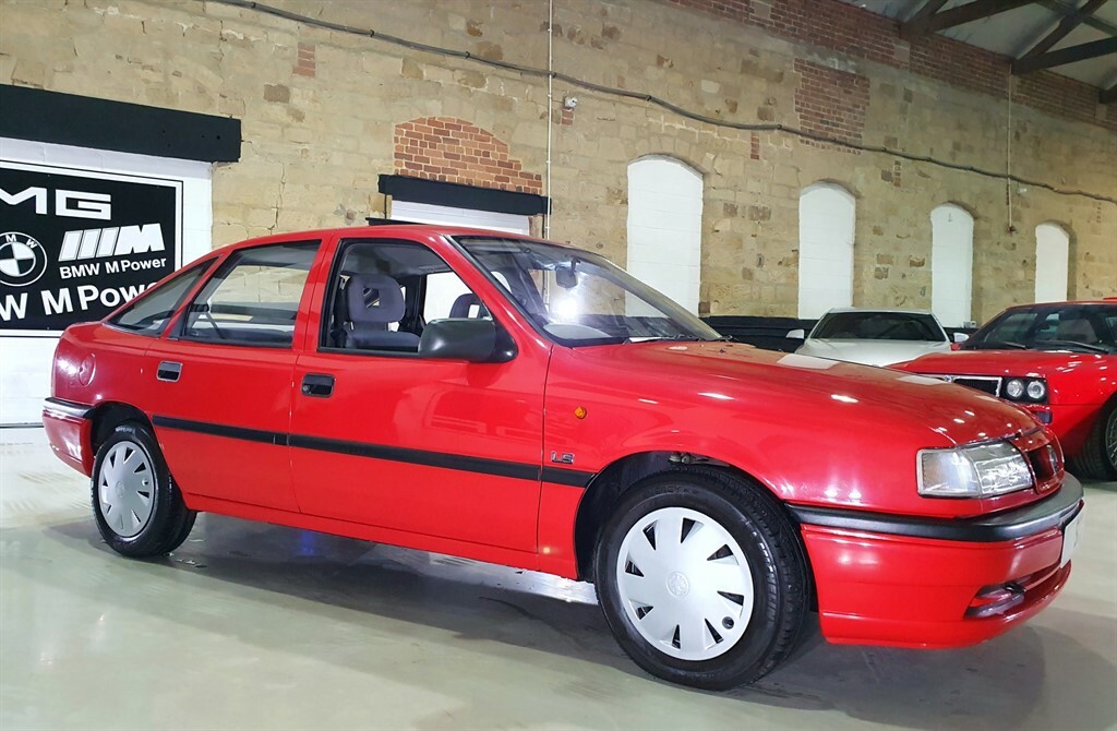 Compare Vauxhall Cavalier Red K110NMF Red