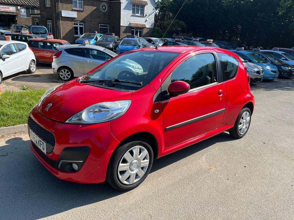 Compare Peugeot 107 1.0 12V Active Euro 5 YA62KFD Red