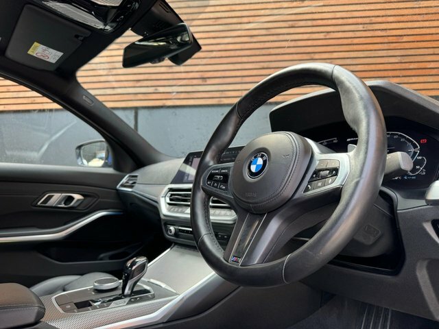 Compare BMW 3 Series 2021 2.0 330E M Sport 288 Bhp FJ21KRD Blue