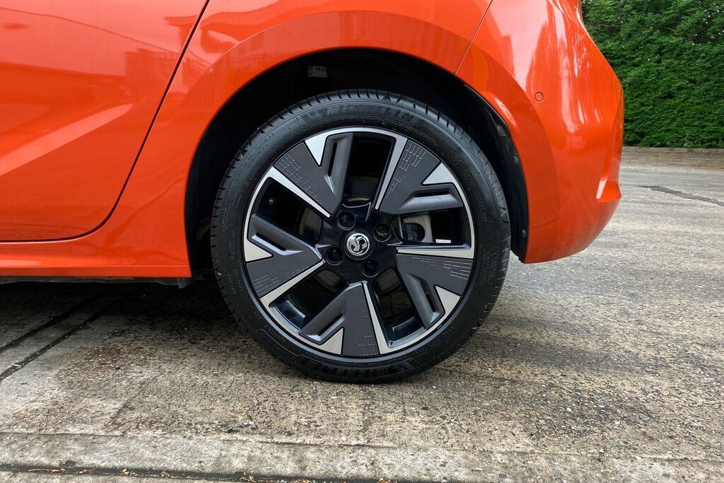 Compare Vauxhall Corsa-e 100Kw Elite Nav 50Kwh 11Kwch VA69VJG Orange