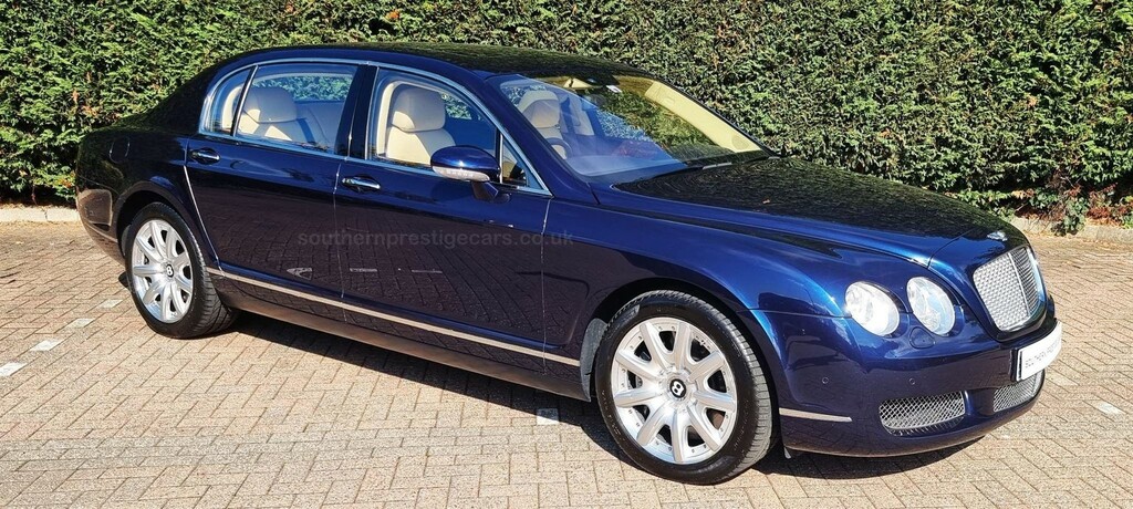Compare Bentley Continental Saloon HF06MGJ 