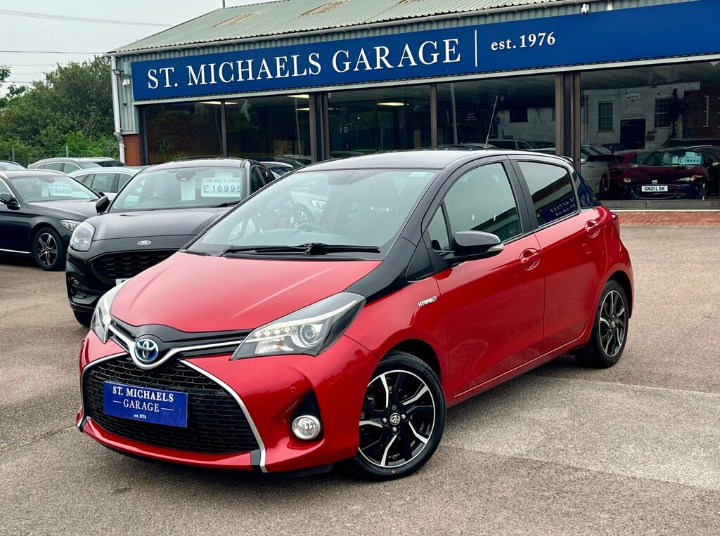 Compare Toyota Yaris Hatchback LV66WLX Red