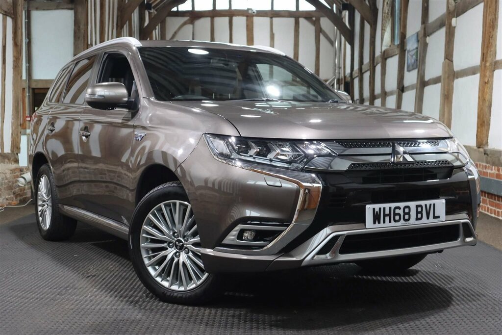 Compare Mitsubishi Outlander 2.4H Twinmotor 13.8Kwh 4H Cvt 4Wd Euro 6 Ss WH68BVL Brown