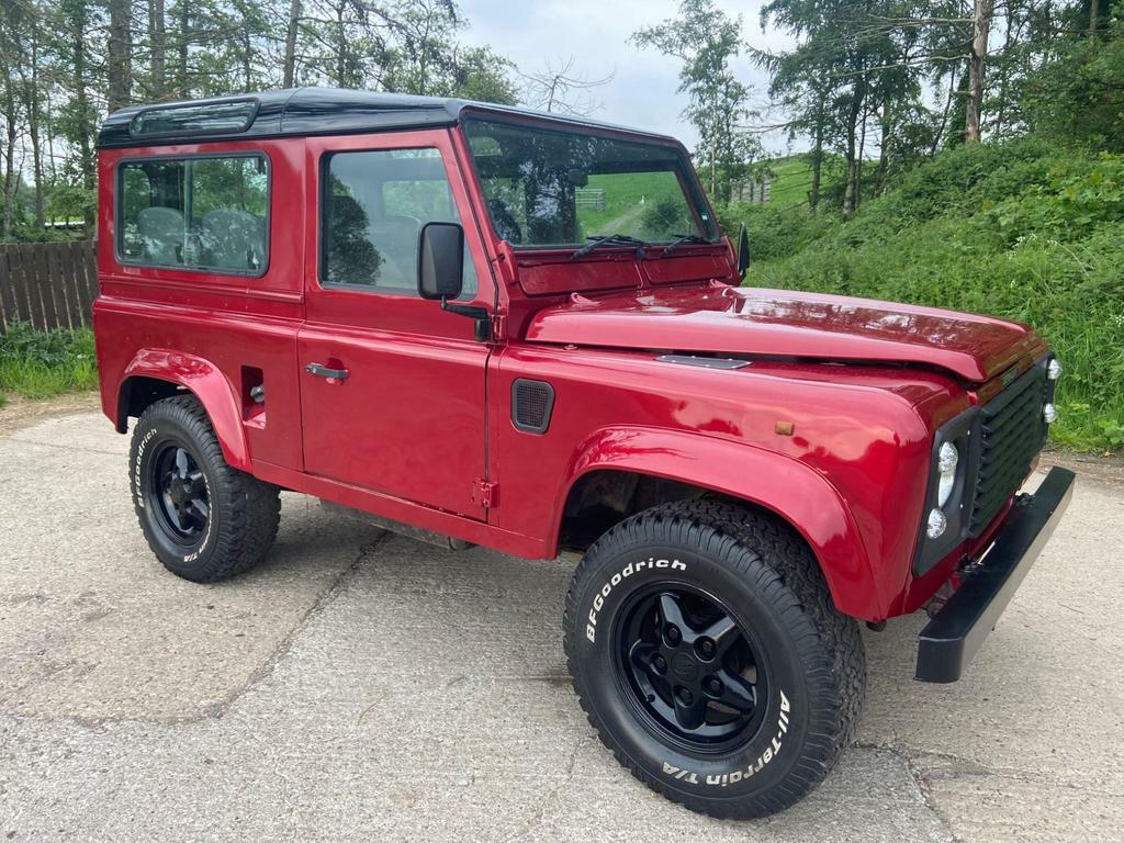 Compare Land Rover Defender 90 90 2.5 Tdi County N285CWG Red
