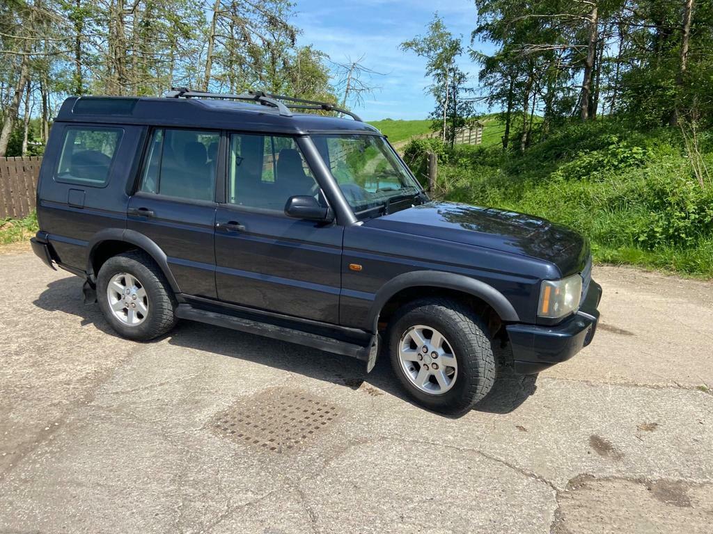 Compare Land Rover Discovery 2.5 Td5 Pursuit KG53ZGA Blue