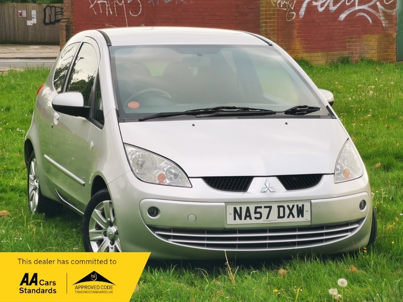 Compare Mitsubishi Colt Cz2 NA57DXW Silver