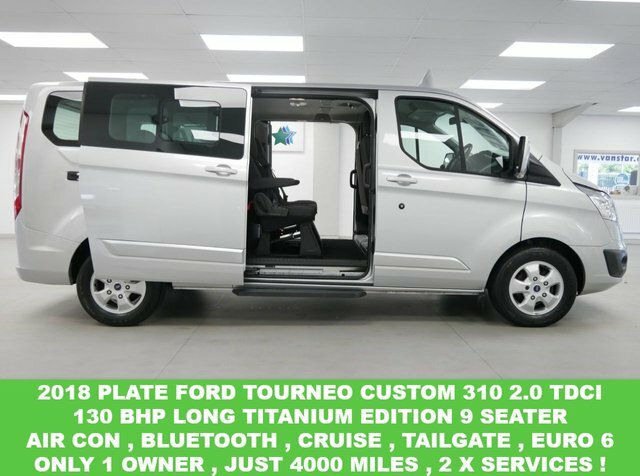 Compare Ford Tourneo Custom 310 2.0 Tdci 130 Bhp Lwb Titanium 9 Seater Just YN18YOT Silver