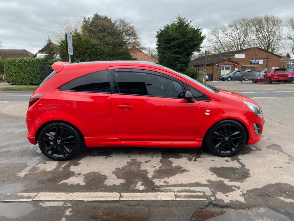 Compare Vauxhall Corsa 1.2 16V ST64OFD Red