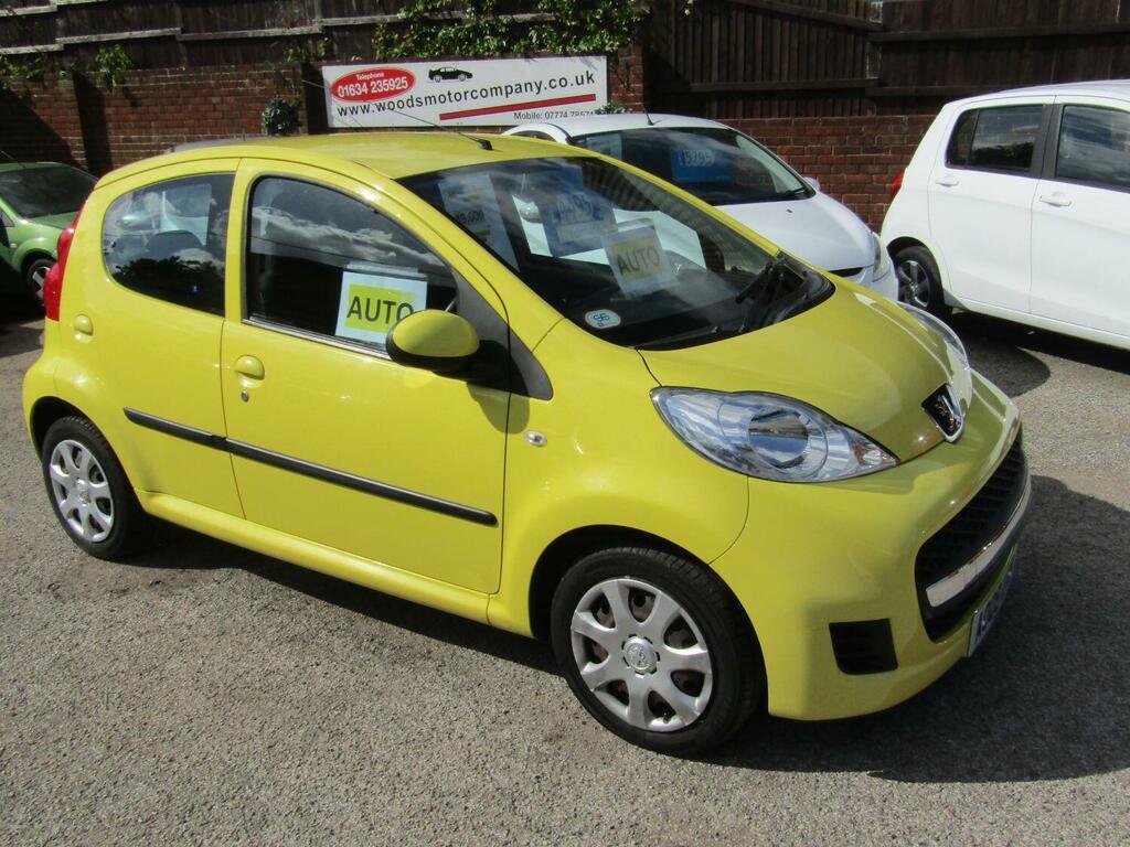 Compare Peugeot 107 1.0 12V A009UVR Yellow
